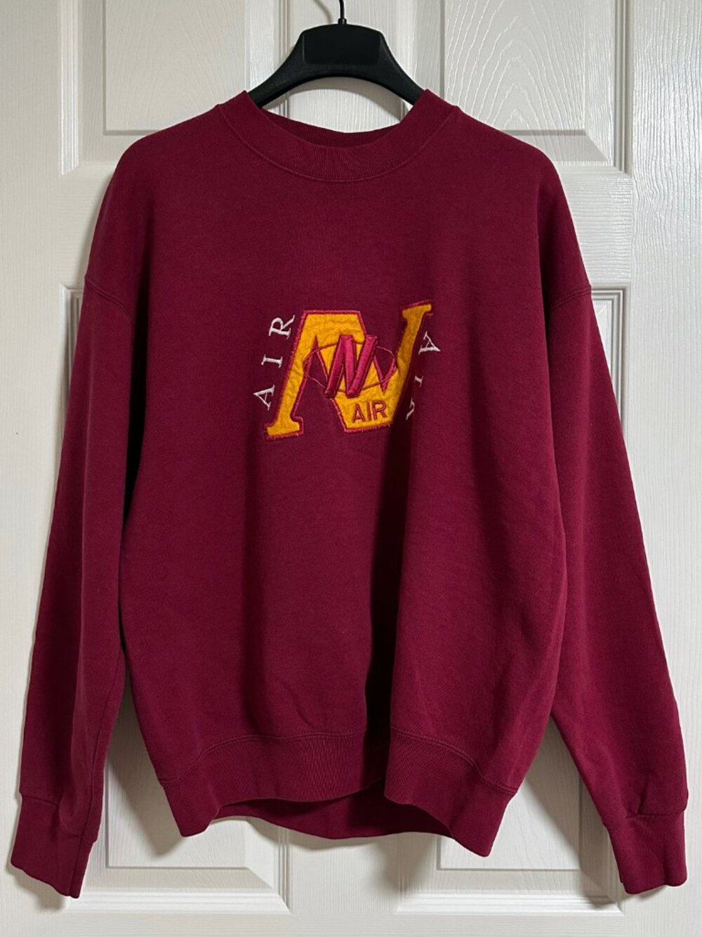 Vintage 1990s Nike Air crewneck sweatshirt with a center-chest logo!
